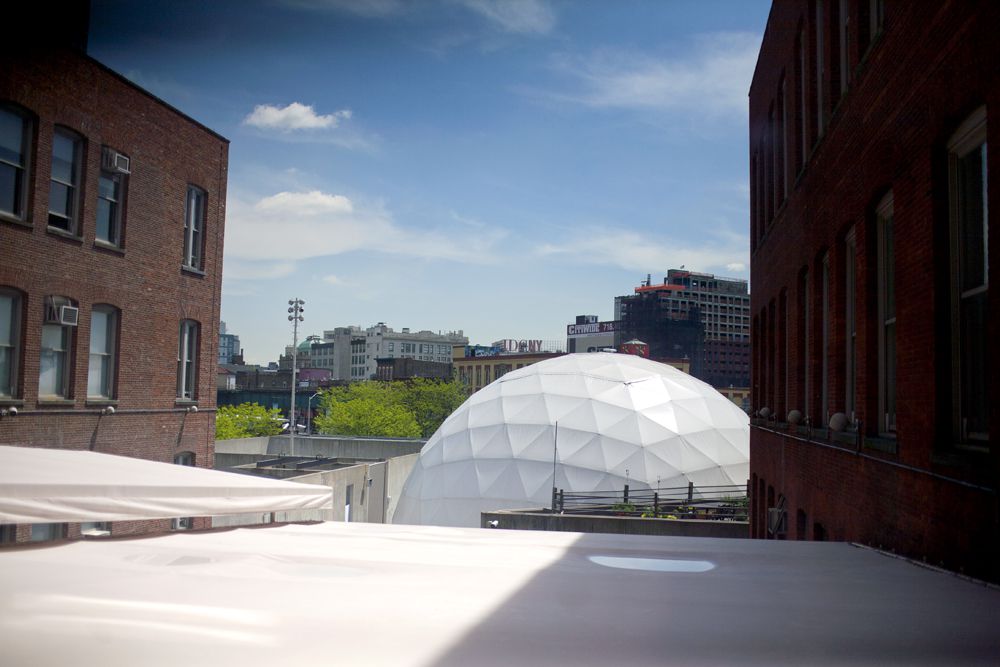 The VW Dome, which was used for the opening press conference, will be taken down this week to make way for the Young Architects Program "<a href="http://gothamist.com/2013/01/17/moma_ps1_gets_party_wall_for_this_s.php">Party Wall" installation</a> in the courtyard.<br/>